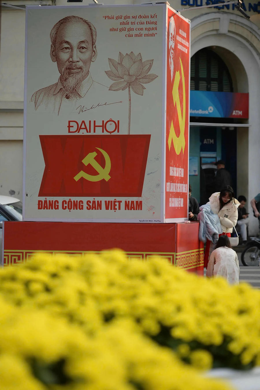 Carefully arranged banners line sidewalks and traffic circles, broadcasting the congress’s political significance in crisp, unambiguous language.