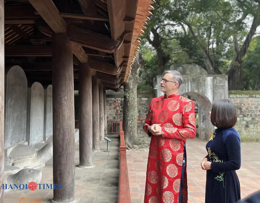 French Ambassador to Vietnam Olivier Brochet learns the history of the Temple of Literature. Photos: Lien Ha/The Hanoi Times