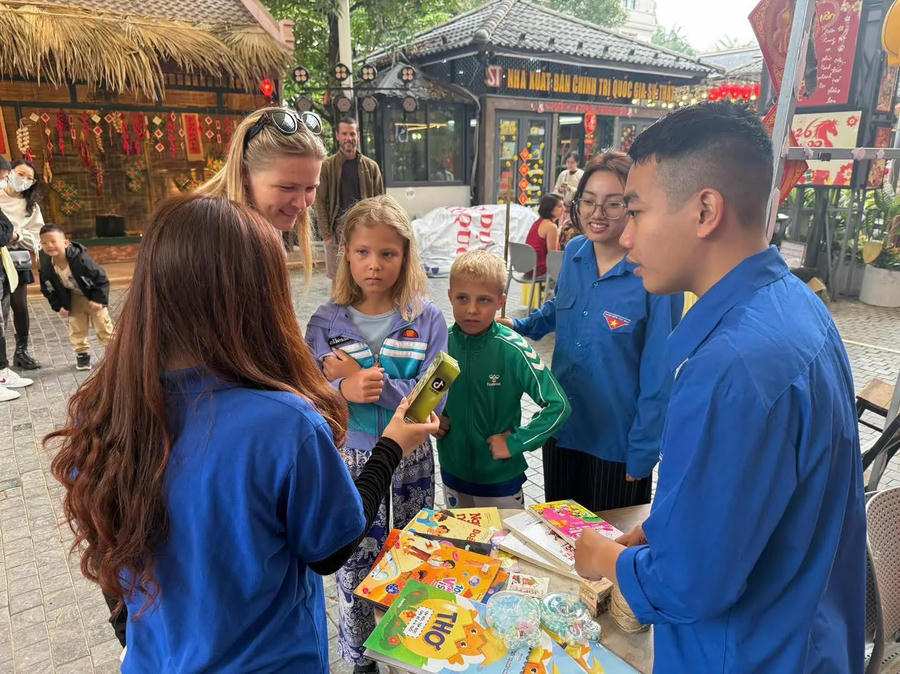 International visitors to Hanoi Book Street during Tet Holiday 2026. Photo courtesy of Hanoi Book Street